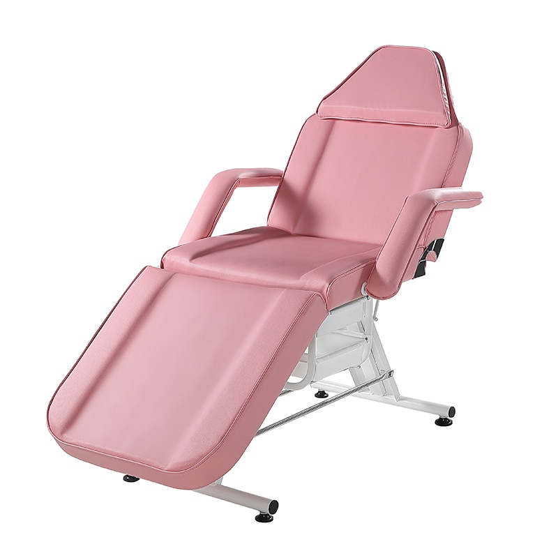 Cama de salón de belleza de color rosa con silla