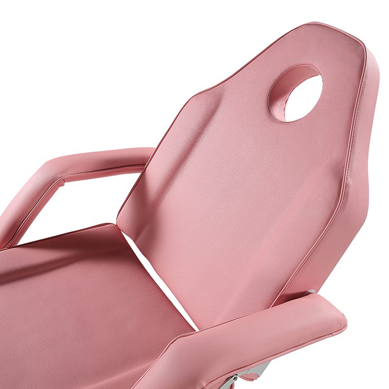 Cama de salón de belleza de color rosa con silla